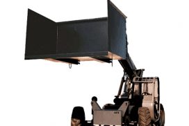 Forklift carries trash hopper to disposal area