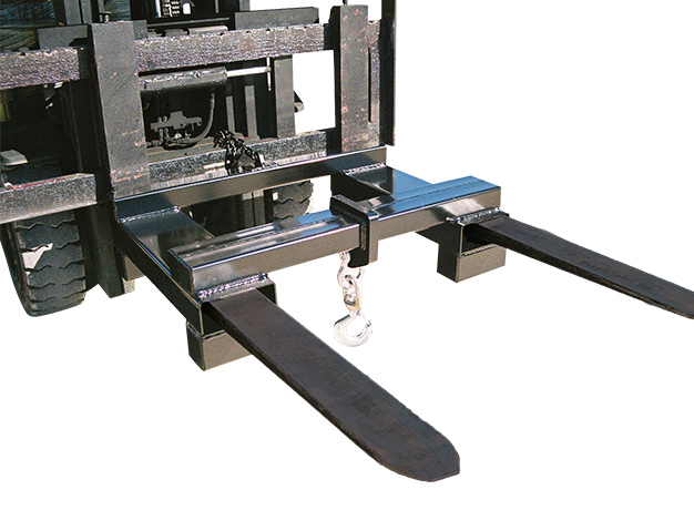 Easily slides on the forks and is pinned behind the heel