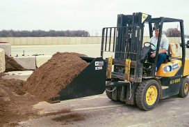 Self Dump Bucket removing dirt