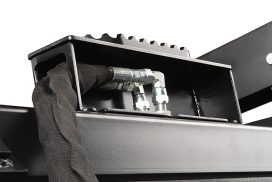 Steel covers and shields protect hydraulic lines