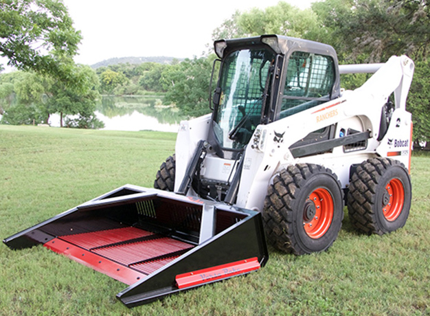 Versa Rake attached to skid-steer